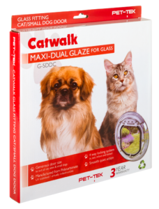 Retail box for the Catwalk Maxi glass-fitting pet door, showing a cat and a small long-haired dog
